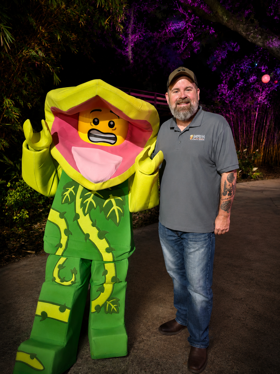 Founder Jack Lambert at LEGOLAND Florida Resort with a park mascot