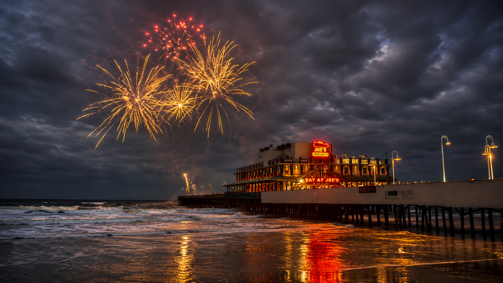 Golden fireworks over the Daytona beachfront — Imperial Pyro serving Volusia County beaches