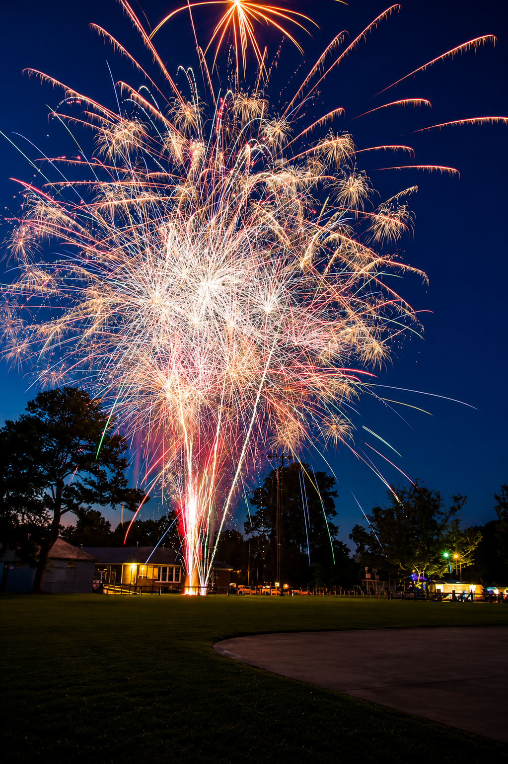 A professional fireworks grand finale over water