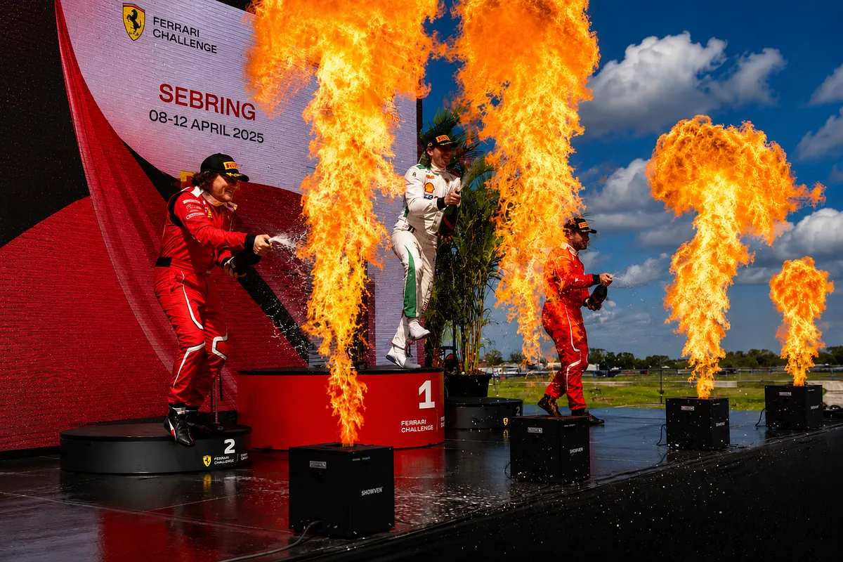 Drivers celebrate amid flame jets on the Ferrari Challenge podium at Sebring